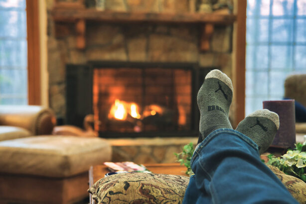feet-in-front-of-fireplace