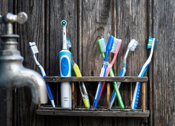 toothbrushes-on-rack